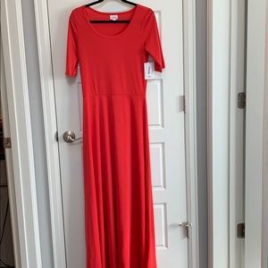Long red dress with a fun Lynnae that matches